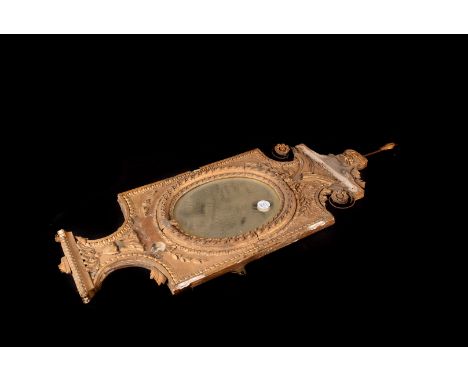 A late Regency gilt wall mirror, in poor condition, still with bracket shelf, together with a Victorian ivory door furniture 