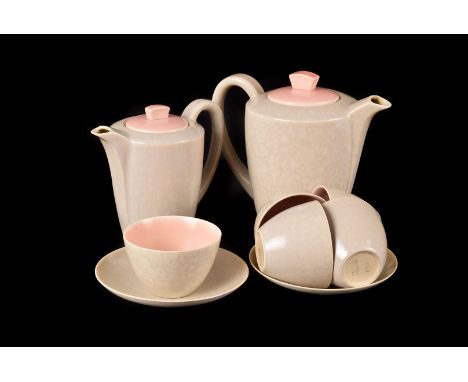 A Poole Pottery two tone part coffee set in pink and mottled grey, with coffee pot, hot water pot, six cups and saucers, suga