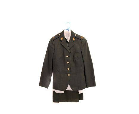 A British woman's Army corps uniform, comprising jacket, blouse and skirt, together with a woman's Royal Army Corps Corporal 
