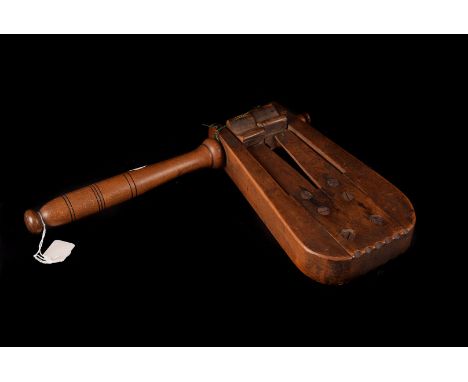 A Vintage Rugby Clapper, of wooden, twin star construction and turned handle of Northern Ireland design. 
