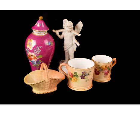 Three items of Royal Worcester blush ivory porcelain, including two miniature coffee cans and a basket, together with a resto