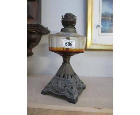 A cast oil lamp (no shade or chimney)