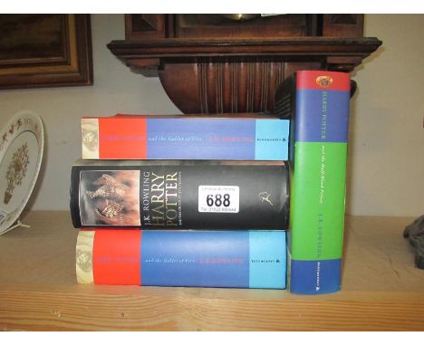 3 Harry Potter hardback books and 1 paperback (The order of the Phoenix and The half blood Prince are first editions)