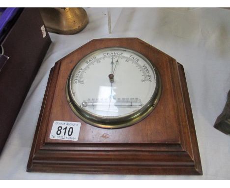 An Edwardian mahogany barometer with integral thermometer