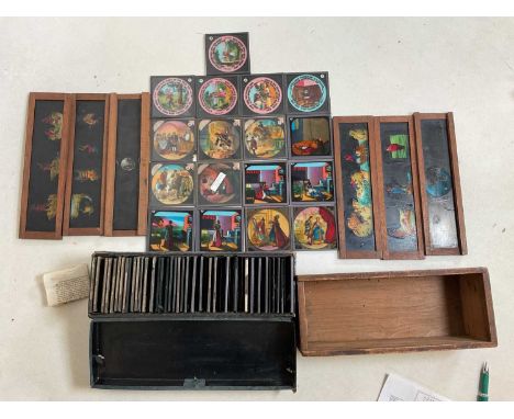 A quantity of magic lantern slides, including standard historical examples, also wooden framed slides featuring more than one
