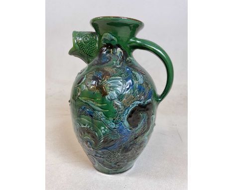 A Barumware Barnstaple Pottery fish jug with fish head spout on green glaze, height 30cm, width 20cm.