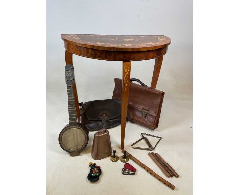 An Italian inlaid musical table with lift up top, height 64cm, width 63cm, depth 33cm, and a collection of musical instrument