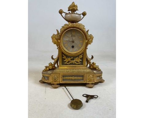 A late 19th century French ormolu mantel clock with Roman numerals to the circular dial and eight day movement, height 35cm, 