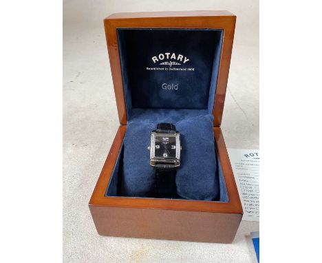 ROTARY; a Reverso dual time diamond set quartz lady’s wristwatch, with stainless steel case, Roman numerals to the mother of 