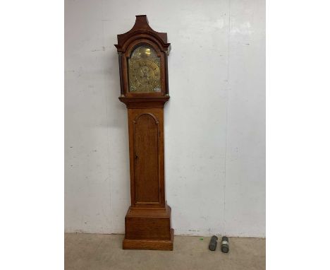 A 19th century oak longcase clock with brass face inscribed Barthrop, height 217cm, width 49cm.