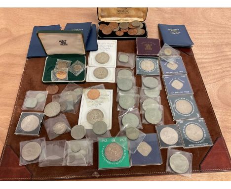 A collection of coins including silver wedding crowns, Churchill crowns, Britain's first decimal coins, pennies and halfpenni