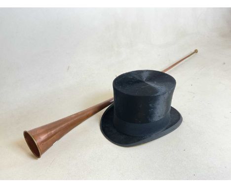 A silk top hat, 'extra quality', A J White maker's label and a copper and brass hunting horn. Hat dimensions:- Internal circu