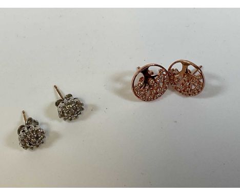 A pair of 9ct gold diamond stud earrings and a pair of rose gold coloured silver earrings marked 925