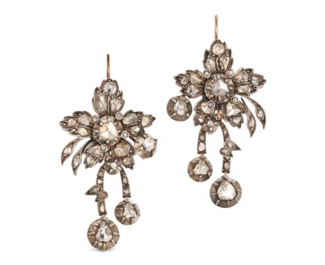 A PAIR OF ANTIQUE DIAMOND DROP EARRINGS in rose gold and silver, designed as flowers with articulated drops, set throughout w