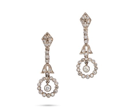 A PAIR OF VINTAGE DIAMOND DROP EARRINGS in white gold, each comprising a row of round brilliant cut diamonds, suspending a ro