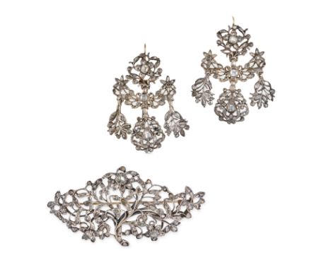 A FINE ANTIQUE DIAMOND BROOCH AND EARRINGS SUITE, 18TH CENTURY in silver, the brooch in foliate design set with table and ros