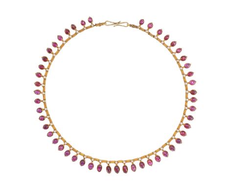 GIULIANO, AN ANTIQUE RUBY AND PEARL FRINGE NECKLACE in yellow gold, comprising fluted links suspending links set with pearls 