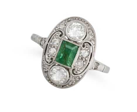 AN EMERALD AND DIAMOND DRESS RING, EARLY 20TH CENTURY set with a rectangular step cut emerald accented on each end by a trans