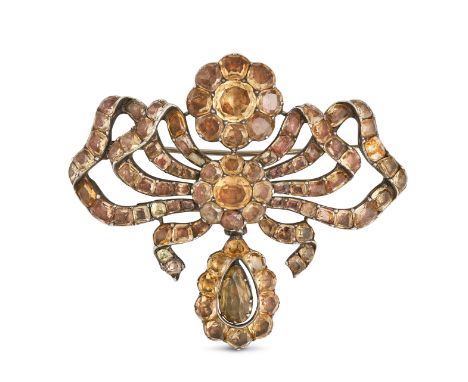 AN ANTIQUE PORTUGUESE TOPAZ GIRANDOLE BROOCH, CIRCA 1800 in silver, the ribbon and floral motifs set with round, cushion, ste