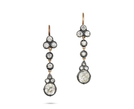 A PAIR OF DIAMOND DROP EARRINGS in yellow gold and silver, comprising a row of old cut diamonds, the diamonds all totalling a