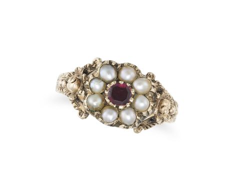 AN ANTIQUE GARNET AND PEARL RING in yellow gold, set with a round cut garnet in a cluster of pearls, no assay marks, size O1/