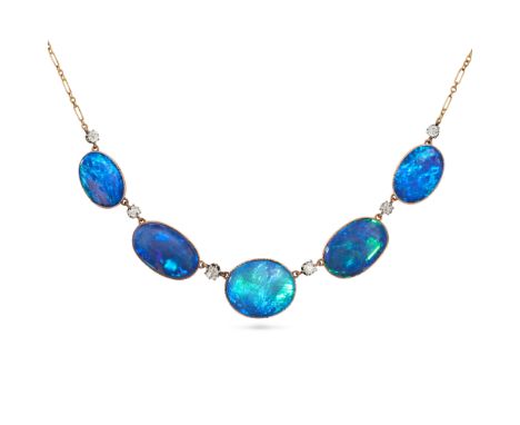 AN ANTIQUE OPAL AND DIAMOND NECKLACE in yellow gold, comprising a row of fancy links set with oval cabochon opals, accented b