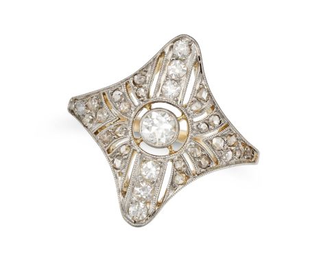 AN ANTIQUE DIAMOND DRESS RING, EARLY 20TH CENTURY in yellow gold and platinum, set with an old European cut diamond accented 