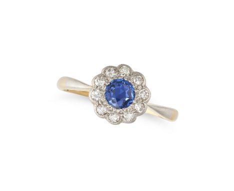 A SAPPHIRE AND DIAMOND CLUSTER RING in 18ct yellow gold, set with a round cut sapphire in a cluster of round cut diamonds,&nb