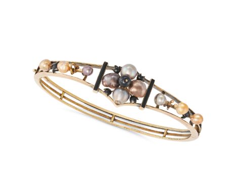 AN ANTIQUE NATURAL PEARL BANGLE in yellow gold, set with ten natural pearls in an openwork design, accented by black enamel, 
