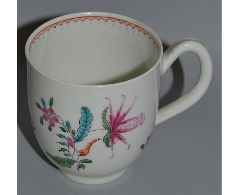 AN 18TH CENTURY WORCESTER COFFEE CUP enamelled with unusual flower sprays the interior with dot and loop border King 12.