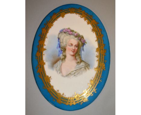 A GOOD PAIR OF 19TH CENTURY “SEVRES” OVAL PORTRAIT PLAQUES, LOUIS AND MARIE ANTOINETTE within gilt and pale blue borders. 9in