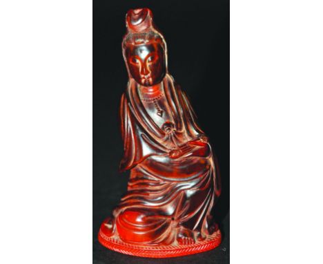  A GOOD QUALITY 19TH/20TH CENTURY CHINESE CARVED HORN FIGURE OF GUANYIN, the goddess seated in flowing robes with one knee ra