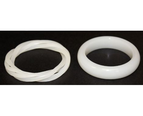 A CHINESE WHITE JADE-LIKE THREE-STRAND BANGLE, 3.25in diameter, the inner rim approx. 2.25in diameter; together with a white 