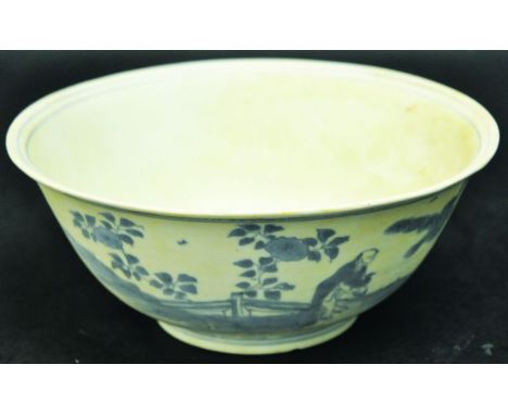 A 17TH CENTURY CHINESE BLUE & WHITE PORCELAIN SHIPWRECK BOWL, the sides painted with a scene of a sage and boy attendant in a