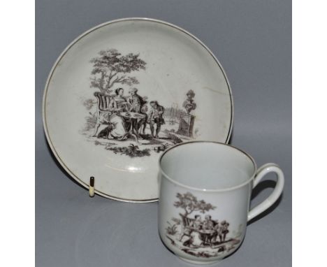 A WORCESTER CUP AND SAUCER “THE TEA PARTY”, SEPIA, CIRCA. 1758-1760, after an engraving done by ROBERT HANCOCK.