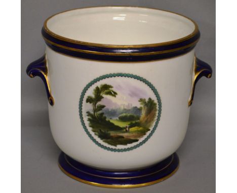 A ROYAL WORCESTER WHITE CIRCULAR JARDINIERE, edged in blue and gilt and painted with oval landscape scenes. Signed K. DAVIS. 