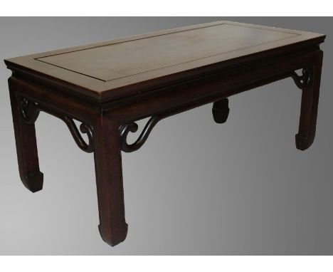  A GOOD CHINESE LOW REDWOOD OPIUM TABLE, with plain carved scroll frieze, 35.9in x 17.8in x 16in high.