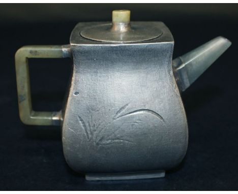 A CHINESE YIXING TYPE CERAMIC TEAPOT & COVER, with jade-like fittings and an overall pewter-like finish, the base with a seal