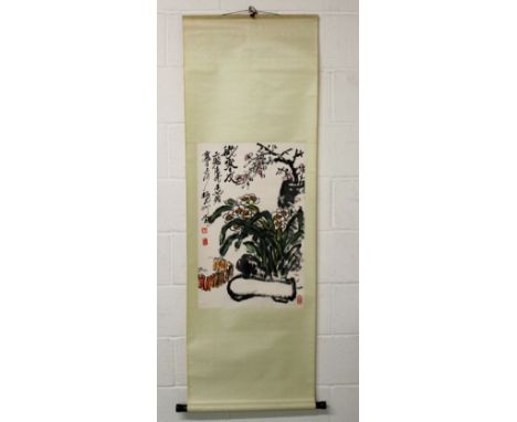 A CHINESE HANGING SCROLL PAINTING ON PAPER, depicting floral arrangements, the painted area approx. 26.5in x 17.5in; together