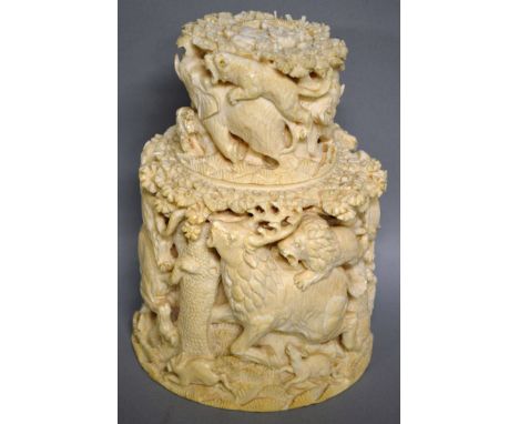 A SUPERB 19TH CENTURY CARVED IVORY CADDY, Possibly European, carved with elephants, lions and deer in a continual design. 6.5