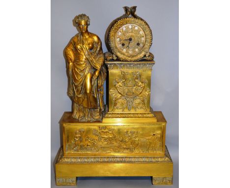 A GOOD FRENCH EMPIRE ORMOLU MANTLE CLOCK, with eight day movement striking on a single bell in classical case, with a full le