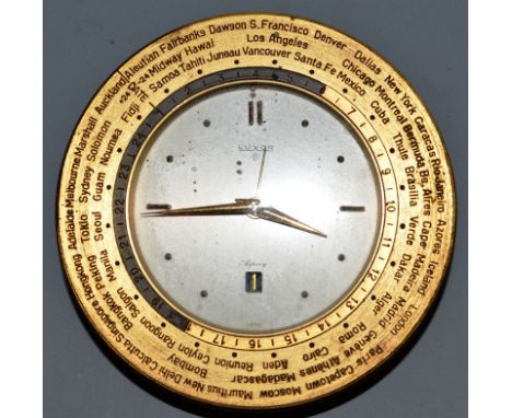 AN ASPREYS LUXOR TRAVELLING CLOCK.