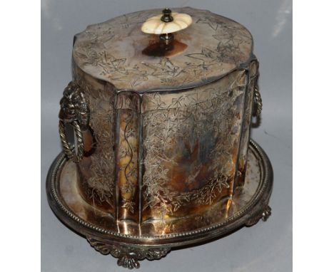 A VICTORIAN ENGRAVED OVAL BISCUIT CADDY.