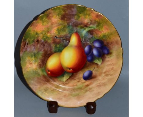 A ROYAL WORCESTER FINE LOBED PLATE painted with fruit, pears and grapes, by HARRY AYRTON, signed date code for 1940.