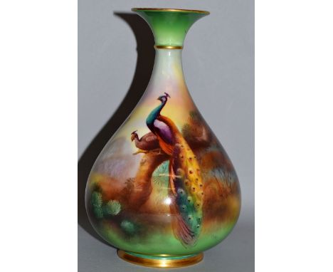 A ROYAL WORCESTER GOOD VASE IN HADLEY STYLE painted with peacocks by C. WHITE signed date code for 1903.