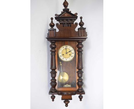 Late 19th century Vienna wall clock in architectural case with glazed door, plain dial with Roman numerals and brass movement