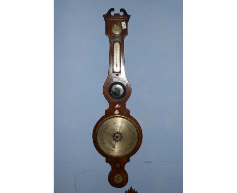 19th century mahogany cased barometer with broken arch pediment over a body with damp/dry meter, thermometer, central mirror,