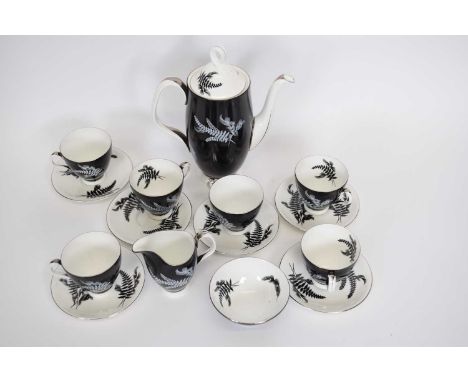 A Royal Albert coffee set comprising coffee pot, milk jug and sugar bowl together with 6 cups and saucers all decorated with 