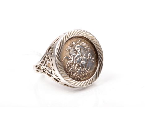 A vintage silver and 'St George' coin ring. Hallmarks for London 1993, size X, 9.3g gross