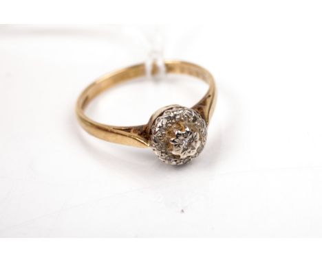 A vintage 18ct gold and diamond nine stone cluster ring. The small eight-cut stones all illusion set in white on yellow gold 